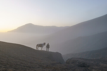 Man with horse in Mount Bromo, East java