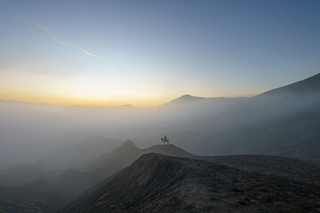Man with horse in Mount Bromo, East java