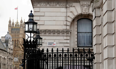 A view of the entrance to Downing Street in Westminster with the Houses of Parliament building in...