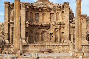 Naklejka premium Jordan. Monumental two-tiered fountain of 2nd century AD. - Nymphaeum. Fountain is one of best preserved places of Gerasa. Gerasa (Jerash) is ancient city that is six and half thousand years old.