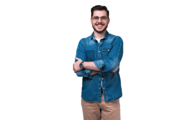 Portrait of happy fashionable handsome man in jeans shirt crossing hands and look at camera