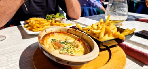 having lunch on french ski slopes,  chicken and french fries