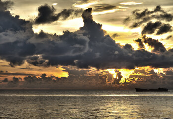 Ship with threatening clouds over South China Sea at Phu Quoc, Vietnam