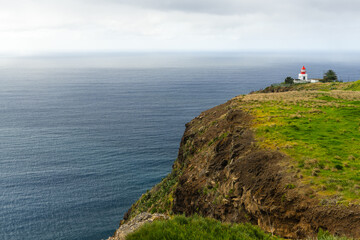 Fototapeta na wymiar Ponta do Pargo Lighthouse in Madeira, Portugal. Volcanic island on Atlantic Ocean