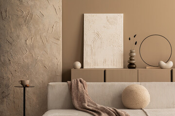 Stylish composition of warm living room interior with mock up poster frame, modular sofa, round...