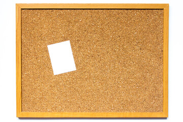Fototapeta premium Corkboard with white note paper placed on white background with copy space