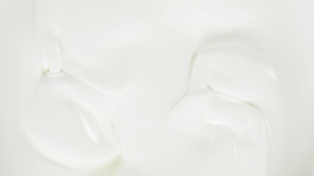 Super slow motion of whirling milk cream. Filmed on high speed cinema camera, 1000fps.