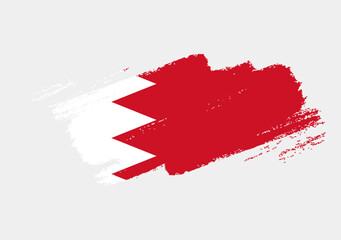 Artistic grunge brush flag of Bahrain isolated on white background. Elegant texture of national country flag