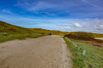 A lonely SUV in Normandy shoreline landscape