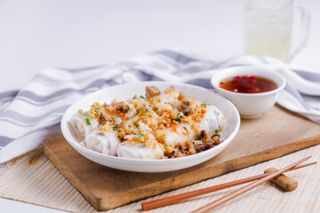 The Extravagant Rice Noodle Roll ready to be served on a white table.