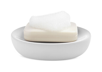 Soap bar with fluffy foam in holder on white background