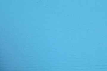 Texture of light blue wooden surface as background, closeup