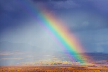 Rainbow in mountains