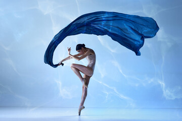 One young ballerina wearing beige bodysuits emotional dancing with fabric silk © Lustre Art Group 