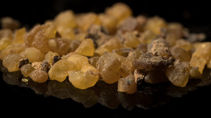 close up view of organic Frankincense Resin isolated on black