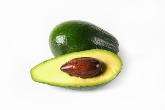 Sliced avocado on a white isolated background. Clipping path