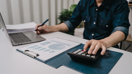 Business bookkeeping with calculator of bookkeeper and household calculating chart graph annual...