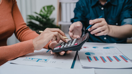 Business bookkeeping with calculator of bookkeeper and household calculating chart graph annual...