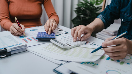 Business bookkeeping with calculator of bookkeeper and household calculating chart graph annual financial account.