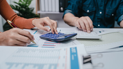 Business bookkeeping with calculator of bookkeeper and household calculating chart graph annual...