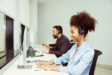 Group of call center business operator customer support team phone services working and talking with headset on desktop computer, Reception secretary answering client phone call at customer service