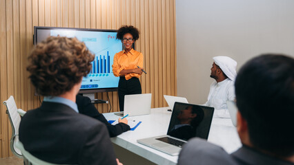 Group of business meeting about documents and ideas at the office desk. Discussion among businesspeople on the latest developments.