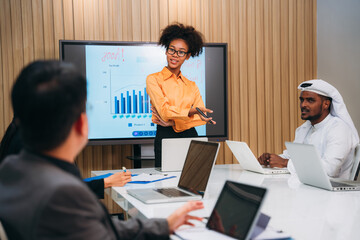 Group of business meeting about documents and ideas at the office desk. Discussion among businesspeople on the latest developments.