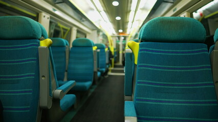 Fototapeta premium Interior of empty train seats. Modern European passenger seat with nobody