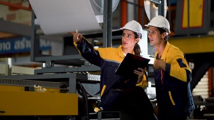 A new generation of engineers in a metal sheet factory.  Studying work methods from supervisors or colleagues and studying by yourself  be taught professionally