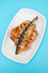 Grilled sardines with sauce on fresh bread