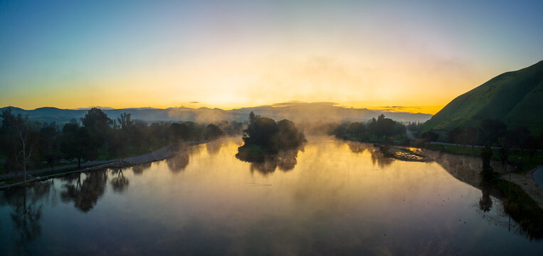 Ethereal Fog Adorns Hart Park Lake during Bakersfield's Golden Hour
