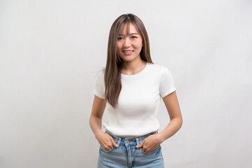Portrait of young beautiful woman smiling over white background studio.