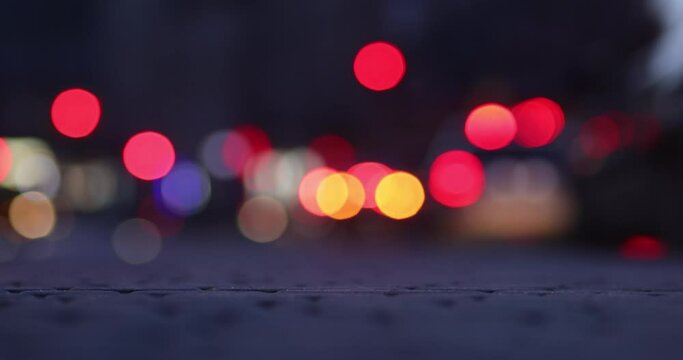 Bokeh of street evening lights, night city with car lights.