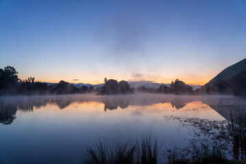 Captivating Dusk Timelapse of Fog Dancing Across Hart Park Lake