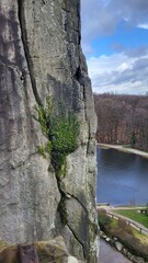 Externsteine rock formation with lake in backgroudn / Externsteine Felsenformation mit See im Hintergrund