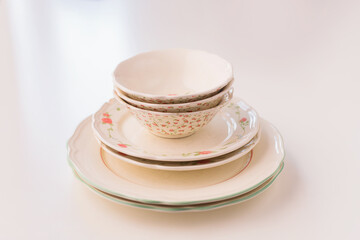 Closeup of porcelain plates and bowls