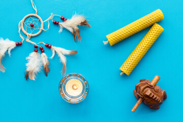 Buddhism meditation background. Candles and incense, top view