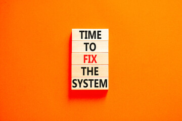 Time to fix the system symbol. Concept words Time to fix the system on wooden block. Beautiful orange table orange background. Business and time to fix the system concept. Copy space.