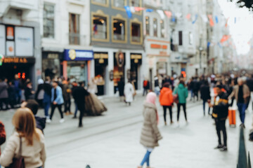 Crowd of anonymous people walking on busy Istanbul street