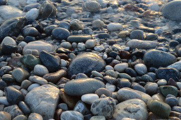 Closeup of wet sea pebbles 