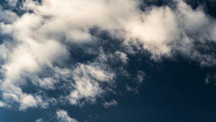 White clouds in blue sky.
