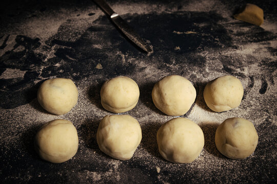 potato dough  plum gnocchi individually prepared on the table ready to be cooked  