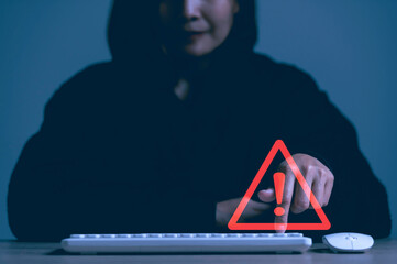 warning signs to be aware of the dangers of being hacked by hackers,Internet malware viruses are destroying computer data. © reewungjunerr