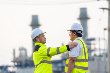 Group Asian man petrochemical engineer working at oil and gas refinery plant industry factory,The people worker man engineer work control at power plant energy industry manufacturing