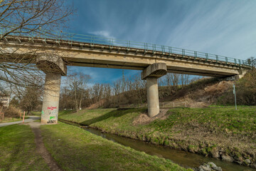 Railway bridge near Rakovnik station in spring color morning