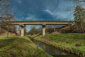 Railway bridge near Rakovnik station in spring color morning
