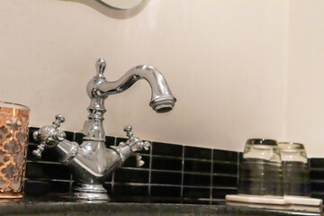 Luxury vintage faucet in the bathroom
