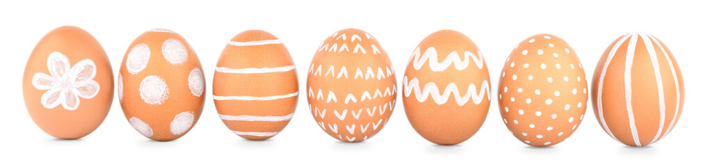 Isolated natural eggs with white patterns. Eco friendly Easter decor. Festive background. Banner
