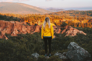 Naklejka premium Woman traveling outdoor exploring Gjipe canyon in Albania active healthy lifestyle in mountains summer vacations eco tourism