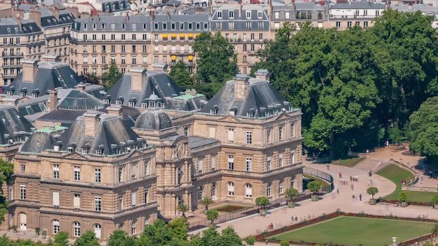 Top view of Paris skyline with The Luxembourg Garden from above timelapse. Main landmarks of european megapolis. Bird-eye view from observation deck of Montparnasse tower. Paris, France